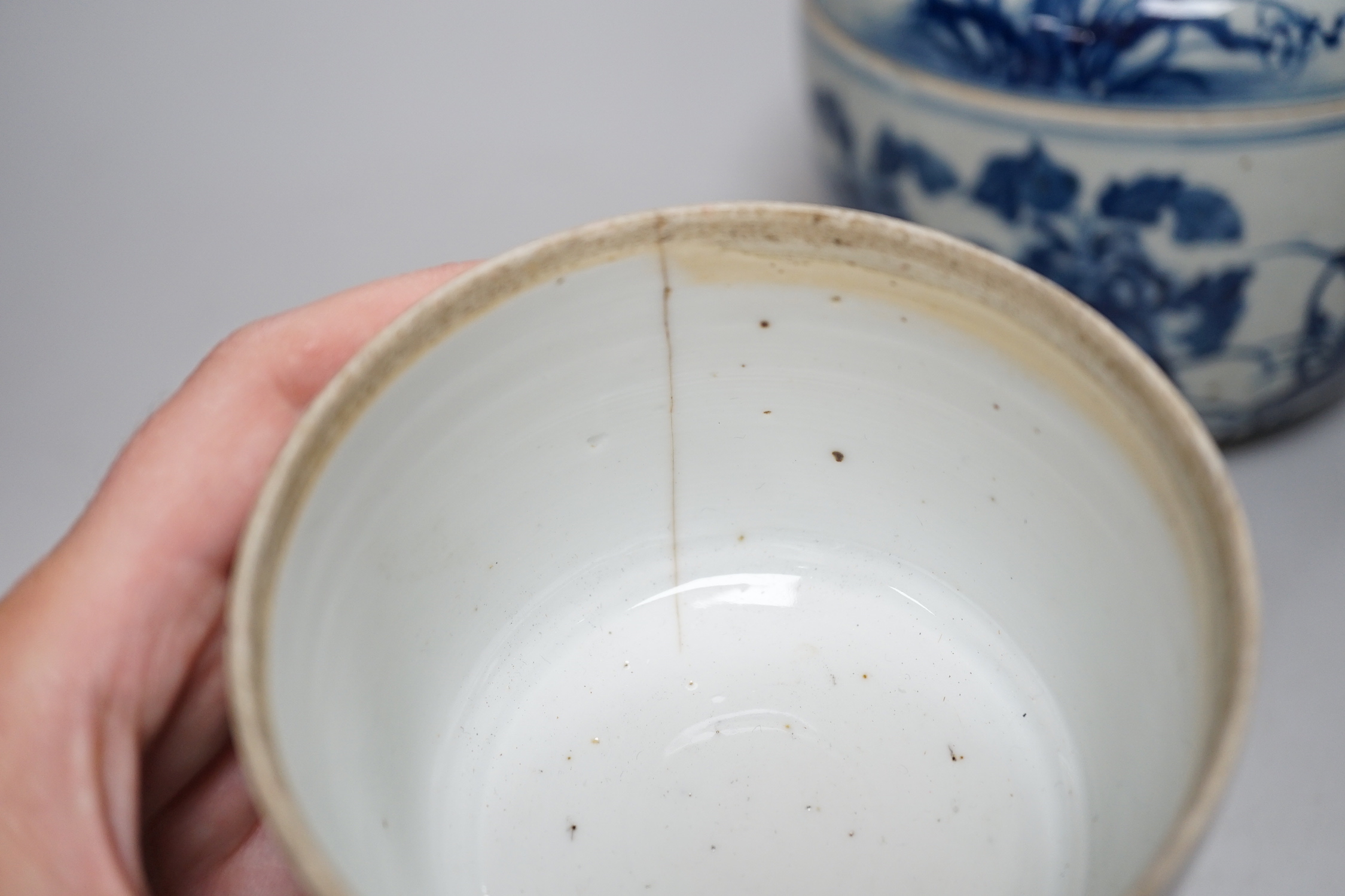 A large Chinese blue and white jar and cover, a similar jar and cover and a dish, large jar and cover, 16cm high